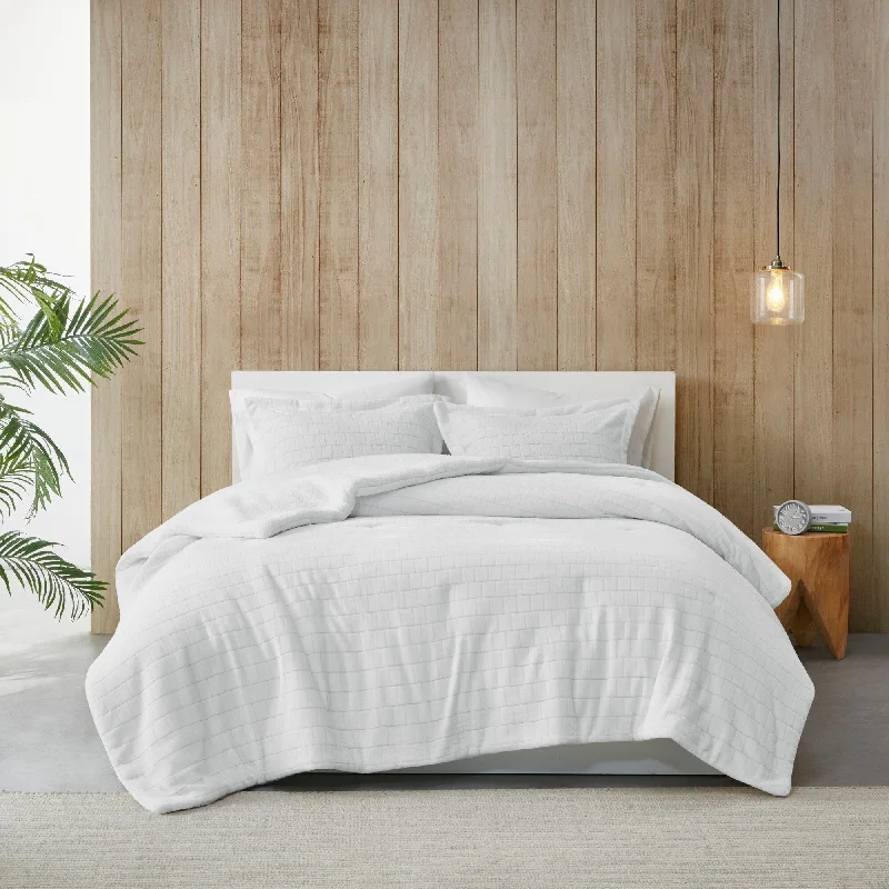 Goose down comforters known for their superior quality and insulationWhitney Plush to Sherpa Comforter Set by Madison Park Goose down comforters known for their superior quality and insulationWhitney Plush to Sherpa Comforter Set by Madison Park