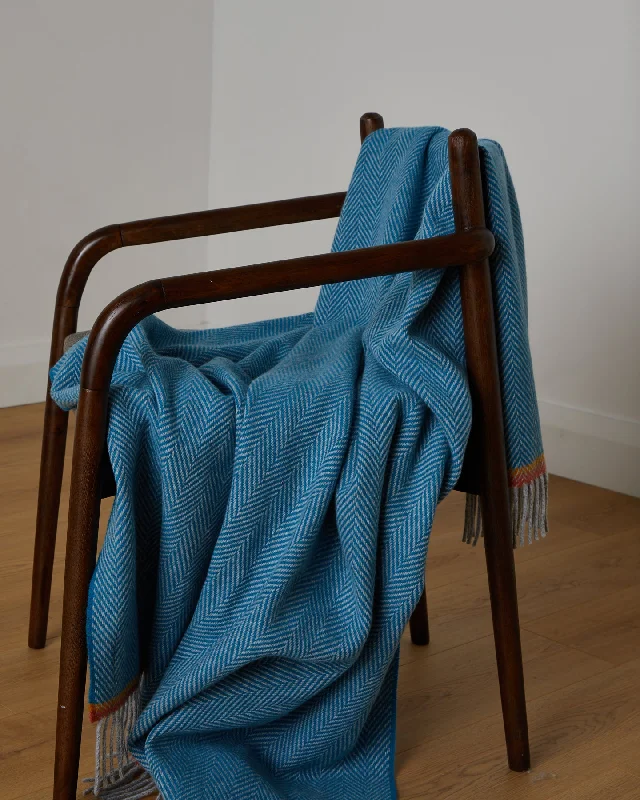 Chenille blankets with a thick and fuzzy textureLinen blankets with a rustic and textured lookFoxford Slaney Cashmere and Lambswool Throw