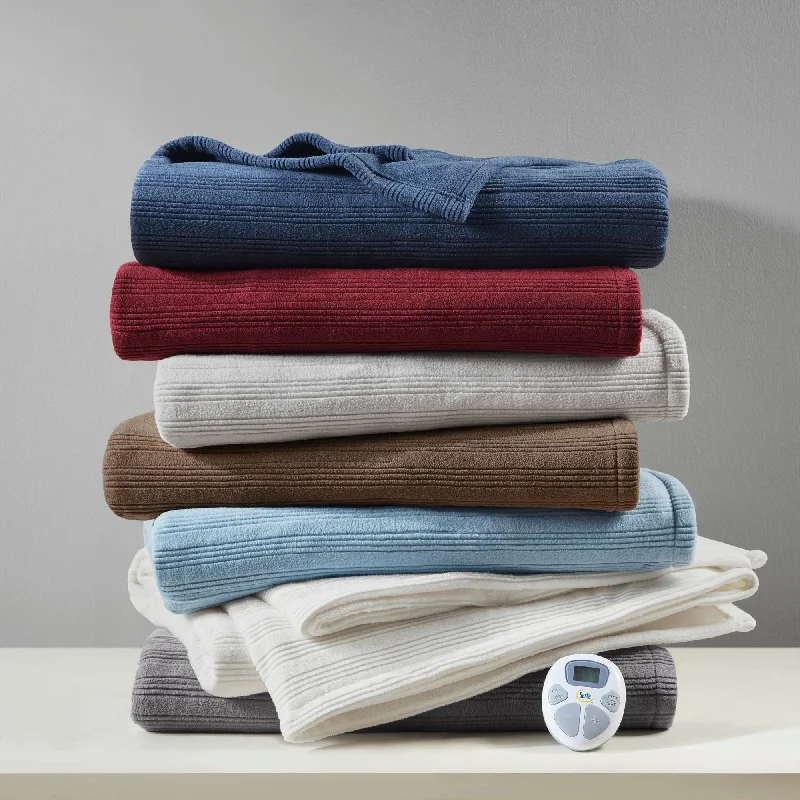 Recycled polyester blankets for an eco - conscious optionKing - size blankets to cover large beds comfortablySerta Travis Heated Tri-Rib Microfleece Blanket Recycled polyester blankets for an eco - conscious optionKing - size blankets to cover large beds comfortablySerta Travis Heated Tri-Rib Microfleece Blanket
