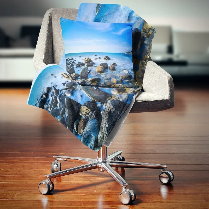 Silk blankets with a smooth and elegant touchAlpaca wool blankets for a hypoallergenic and warm optionDesignart 'Baratti Bay Rocks in Waters at Sunset' Seashore Throw Blanket Silk blankets with a smooth and elegant touchAlpaca wool blankets for a hypoallergenic and warm optionDesignart 'Baratti Bay Rocks in Waters at Sunset' Seashore Throw Blanket