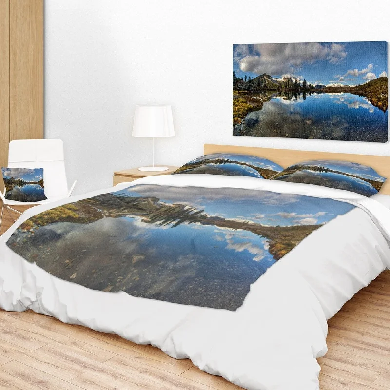 Rayon from bamboo blankets for a silky and breathable feelRecycled polyester blankets for an eco - conscious optionDesignart 'Clear Lake with Pine Trees Panorama' Landscape Fleece Throw Blanket Rayon from bamboo blankets for a silky and breathable feelRecycled polyester blankets for an eco - conscious optionDesignart 'Clear Lake with Pine Trees Panorama' Landscape Fleece Throw Blanket