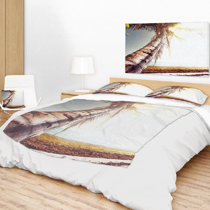 Silk blankets with a smooth and elegant touchAcrylic blankets for a soft and affordable alternativeDesignart 'Huge Bent Coconut Tree To Beach' Landscape Wall Throw Blanket Silk blankets with a smooth and elegant touchAcrylic blankets for a soft and affordable alternativeDesignart 'Huge Bent Coconut Tree To Beach' Landscape Wall Throw Blanket