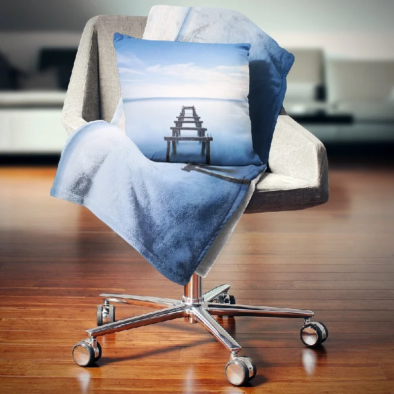 Cotton blankets for breathability and a lightweight feelCotton blankets for breathability and a lightweight feelDesignart 'Jetty Remains in Blue Lake' Seascape Throw Blanket