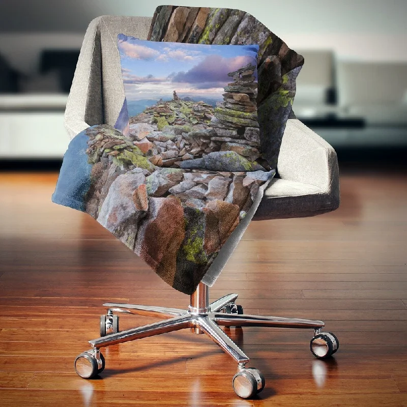 Microfiber blankets that are durable and easy to care forBamboo fiber blankets with natural antibacterial propertiesDesignart 'Piled Stones in Summer Mountains' Landscape Photography Throw Blanket