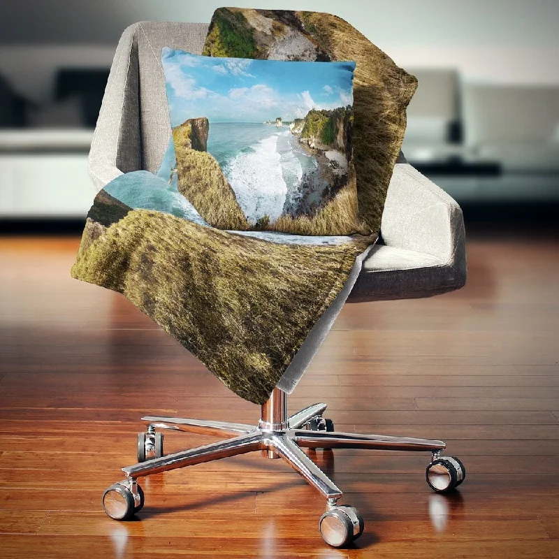 Rayon from bamboo blankets for a silky and breathable feelAcrylic blankets for a soft and affordable alternativeDesignart 'Rocky Beach on the Sumba Island' Seascape Throw Blanket