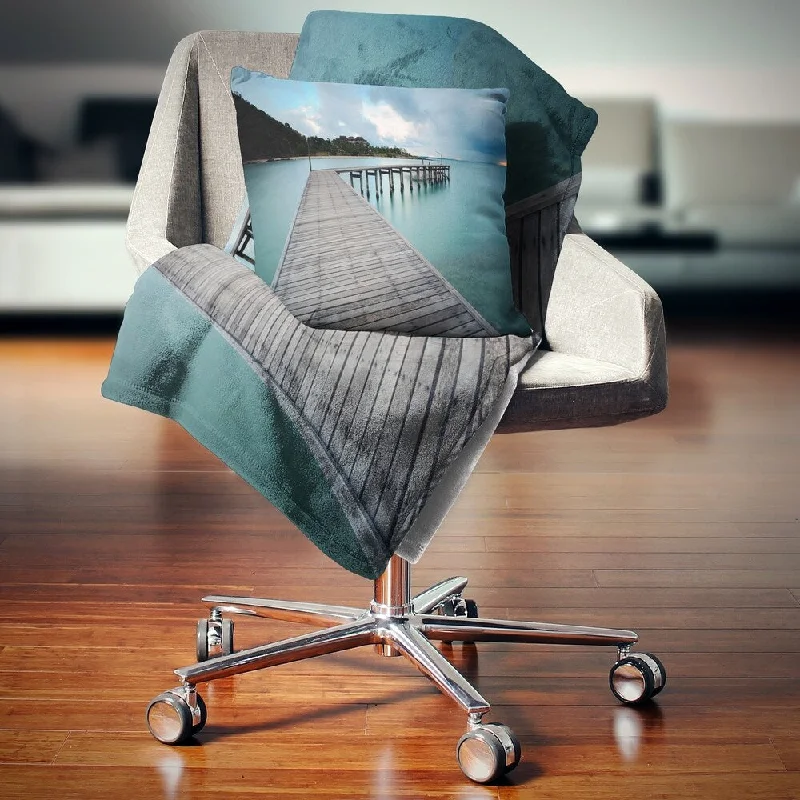 Cotton blankets for breathability and a lightweight feelChenille blankets with a thick and fuzzy textureDesignart 'Wooden Bridge to Calm Ocean' Modern Throw Blanket