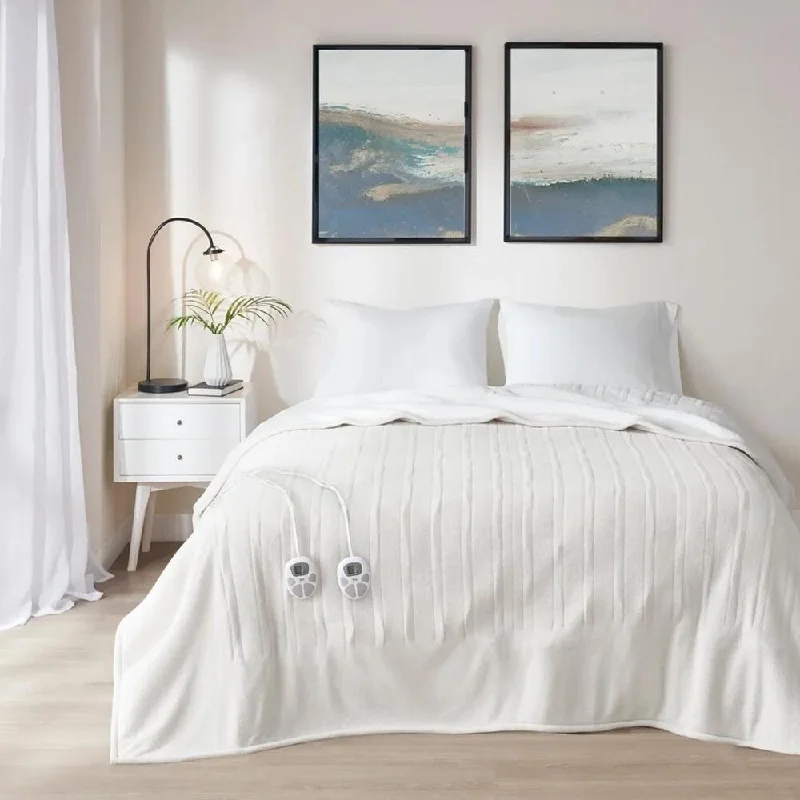 Recycled polyester blankets for an eco - conscious optionKing - size blankets to cover large beds comfortablyKing Solid Fleece to Sherpa Heated Blanket Ivory